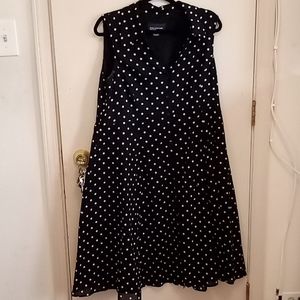 Vestido camisero con forro  bolsillos laterales talla 16 negro de lunares blanco